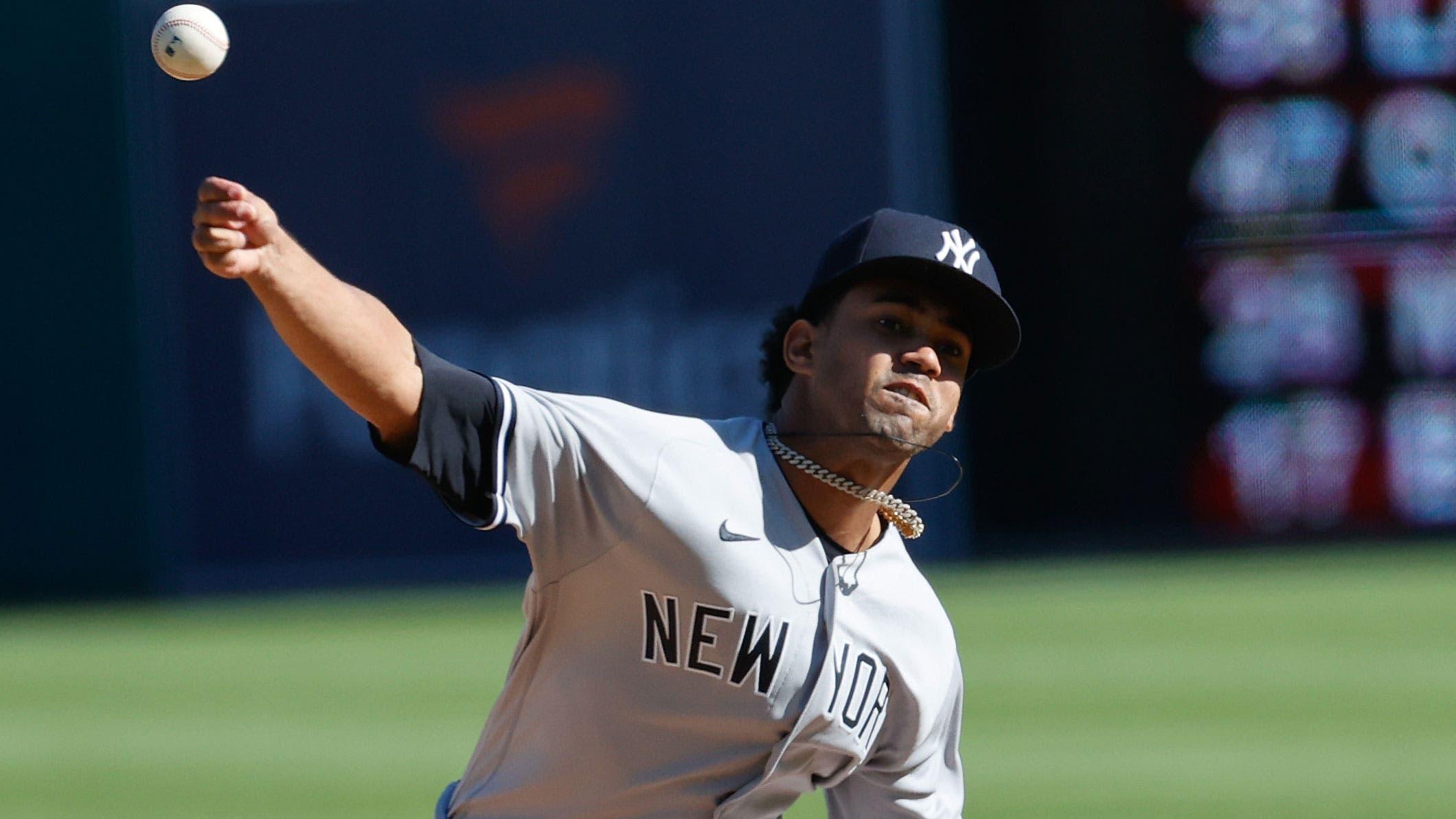 May 29, 2021; Detroit, Michigan, USA; New York Yankees starting pitcher Deivi Garc a (84) throws against the Detroit Tigers in the fourth inning at Comerica Park. / Rick Osentoski-USA TODAY Sports