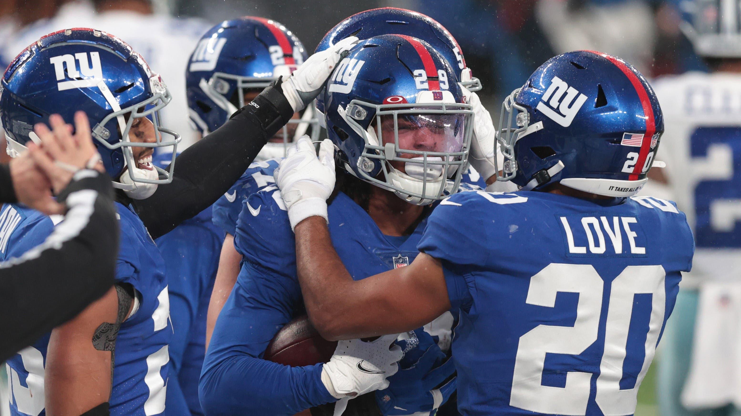 Jan 3, 2021; East Rutherford, NJ, USA; New York Giants safety Xavier McKinney (29) celebrates an interception against the Dallas Cowboys in the second half at MetLife Stadium. / Vincent Carchietta-USA TODAY Sports