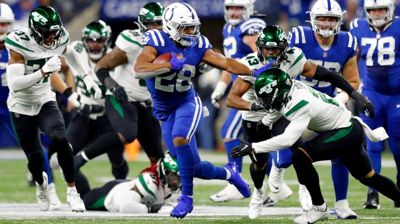 Indianapolis Colts running back Jonathan Taylor (28) rushes the ball Thursday, Nov. 4, 2021, during a game against the New York Jets at Lucas Oil Stadium in Indianapolis.