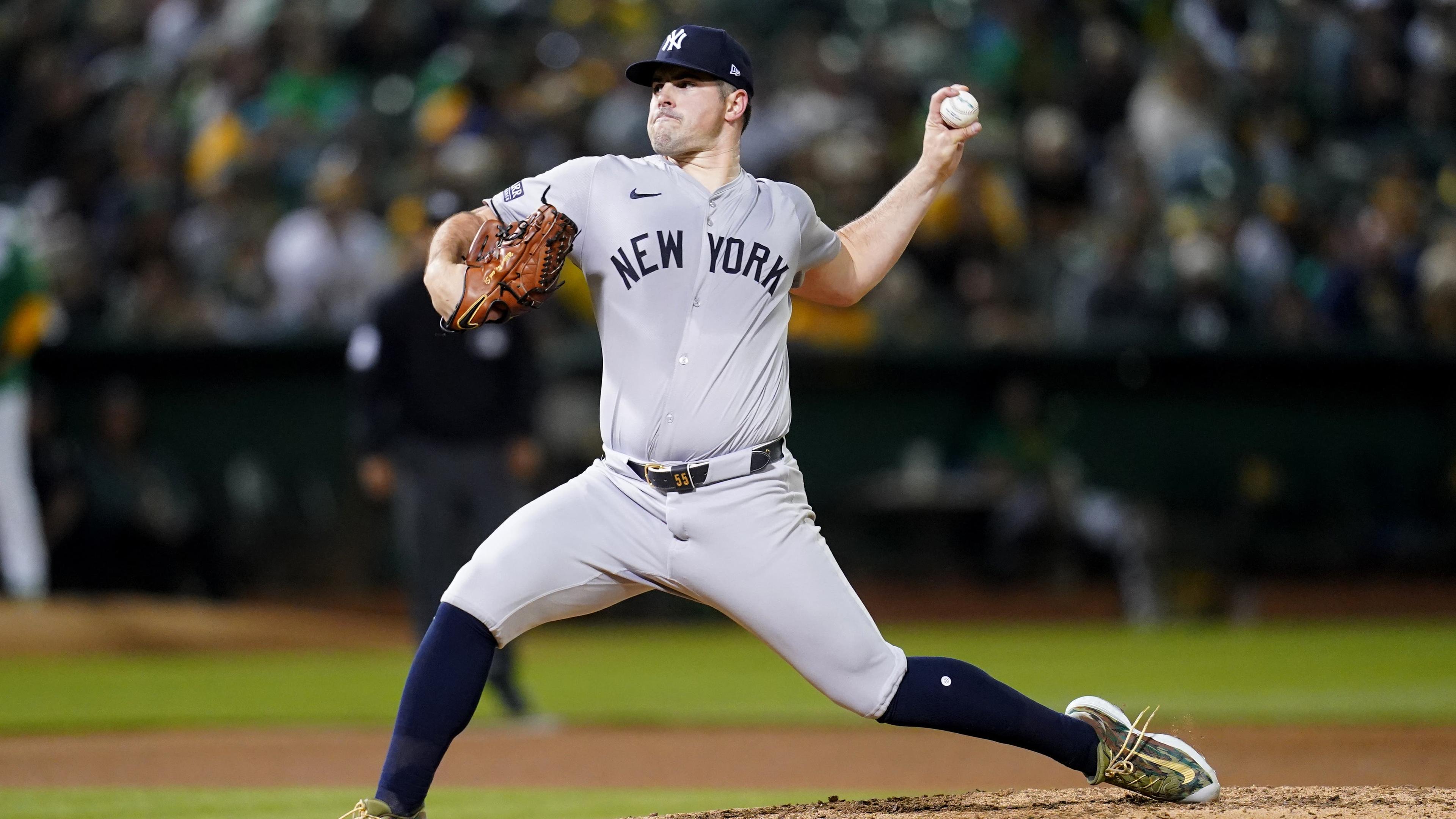 New York Yankees pitcher Carlos Rodon (55) delivers a pitch against the Oakland Athletics in the fifth inning at the Oakland-Alameda County Coliseum. / Cary Edmondson-Imagn Images