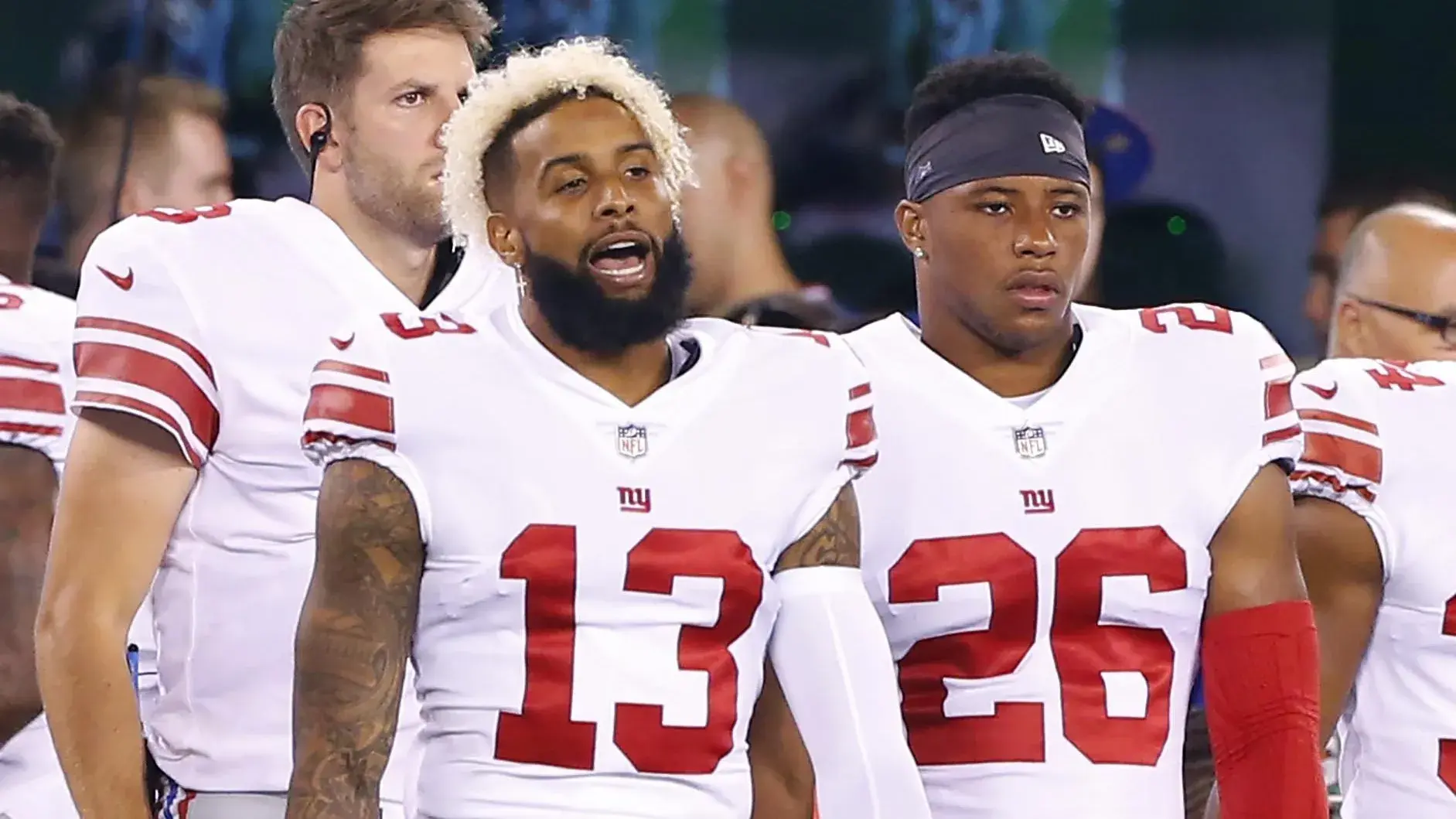 New York Giants wide receiver Odell Beckham (13) and running back Saquon Barkley (26) on sideline during second half against the New York Jets at MetLife Stadium. / Noah K. Murray