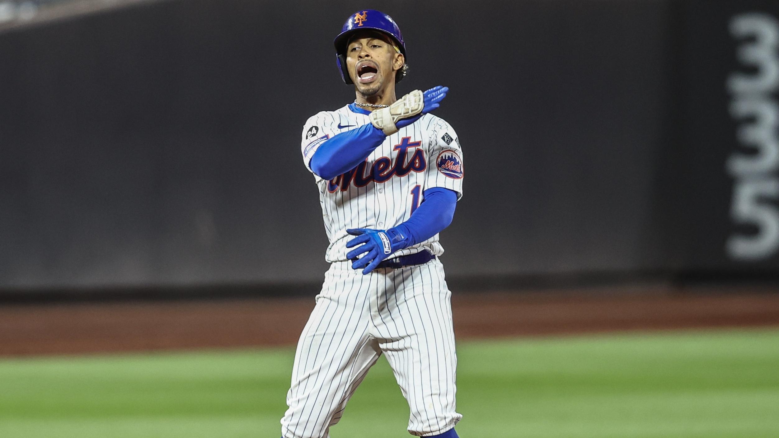 New York Mets shortstop Francisco Lindor (12) celebrates after hitting an RBI double in the eighth inning against the Boston Red Sox at Citi Field