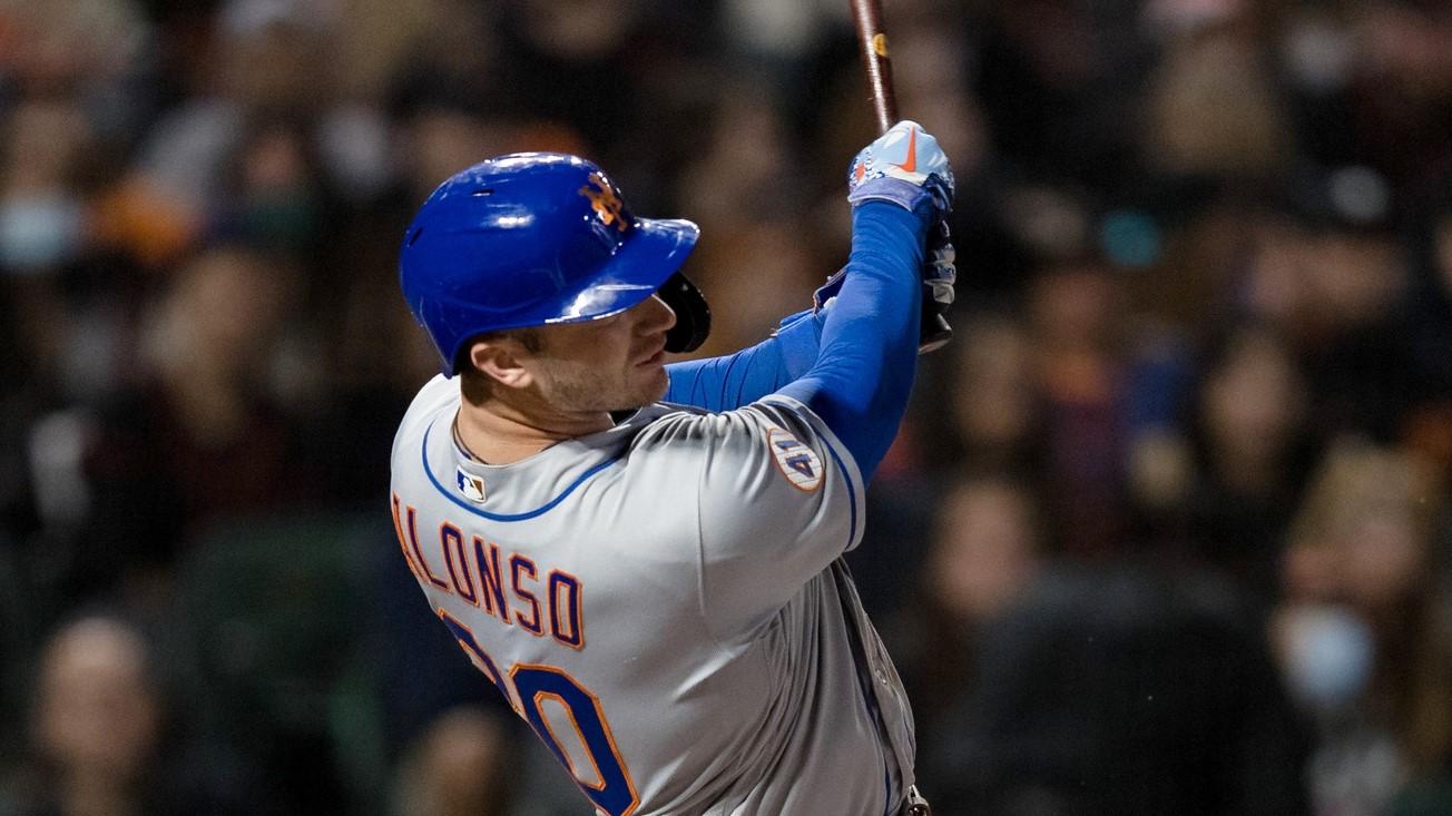 Aug 16, 2021; San Francisco, California, USA; New York Mets first baseman Pete Alonso (20) hits a two-run triple against the San Francisco Giants in the fifth inning at Oracle Park.