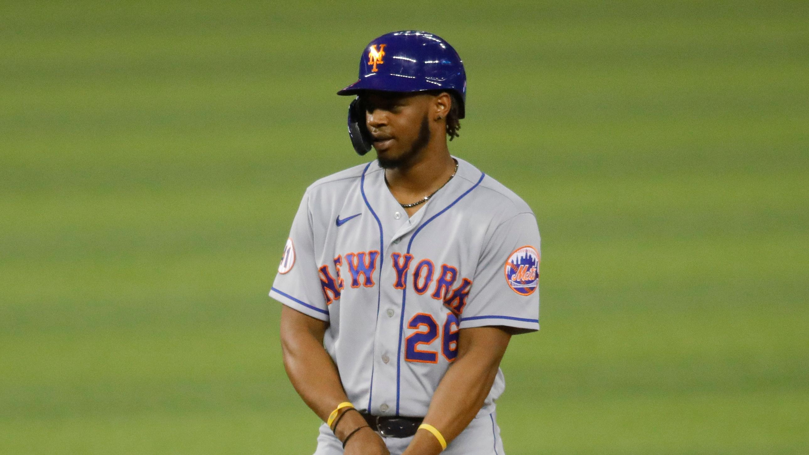 May 21, 2021; Miami, Florida, USA; New York Mets center fielder Khalil Lee (26) reacts after connecting for a base hit against the Miami Marlins during the twelfth inning at loanDepot Park.