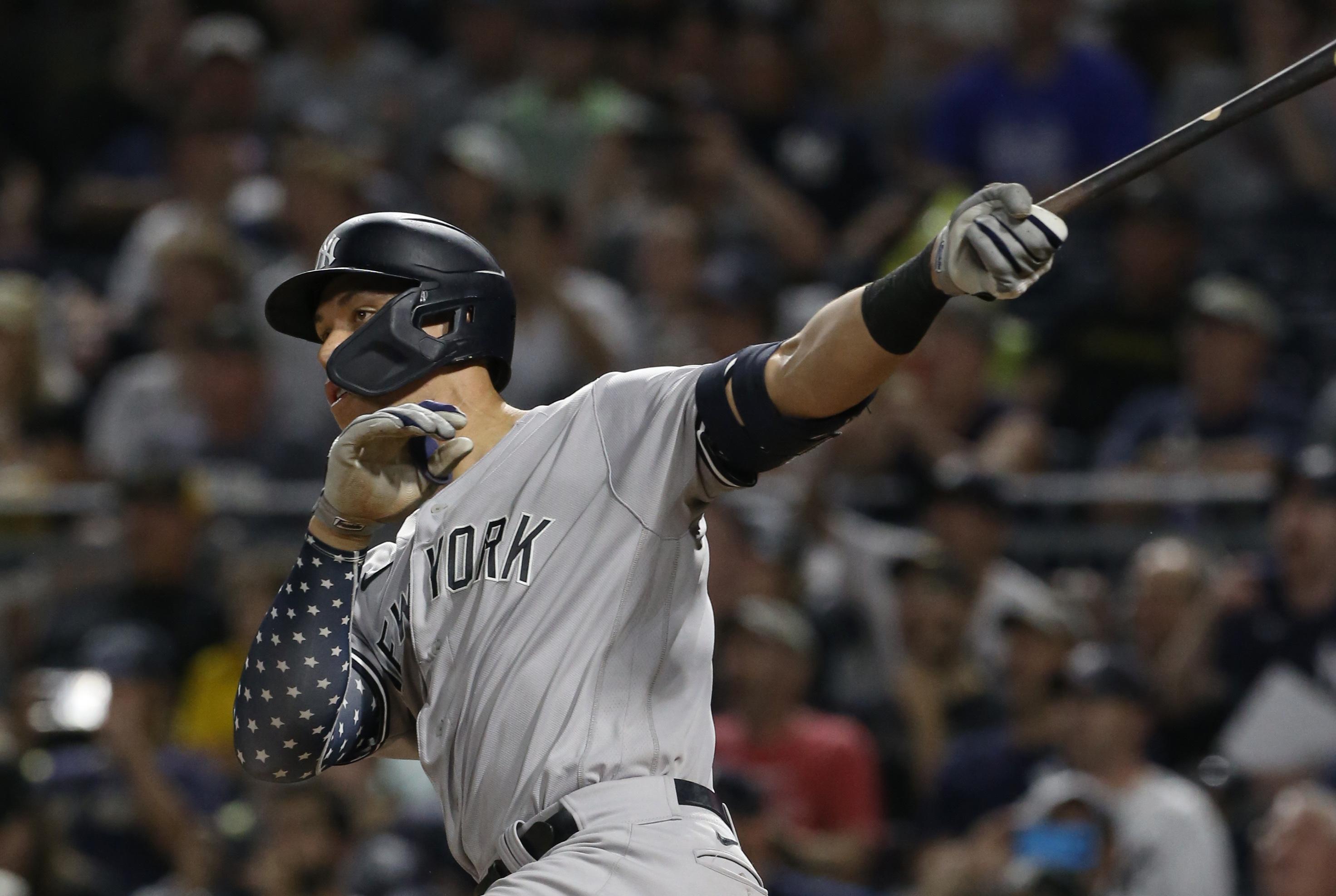 New York Yankees center fielder Aaron Judge (99) hits a grand slam home run against the Pittsburgh Pirates during the eighth inning at PNC Park.