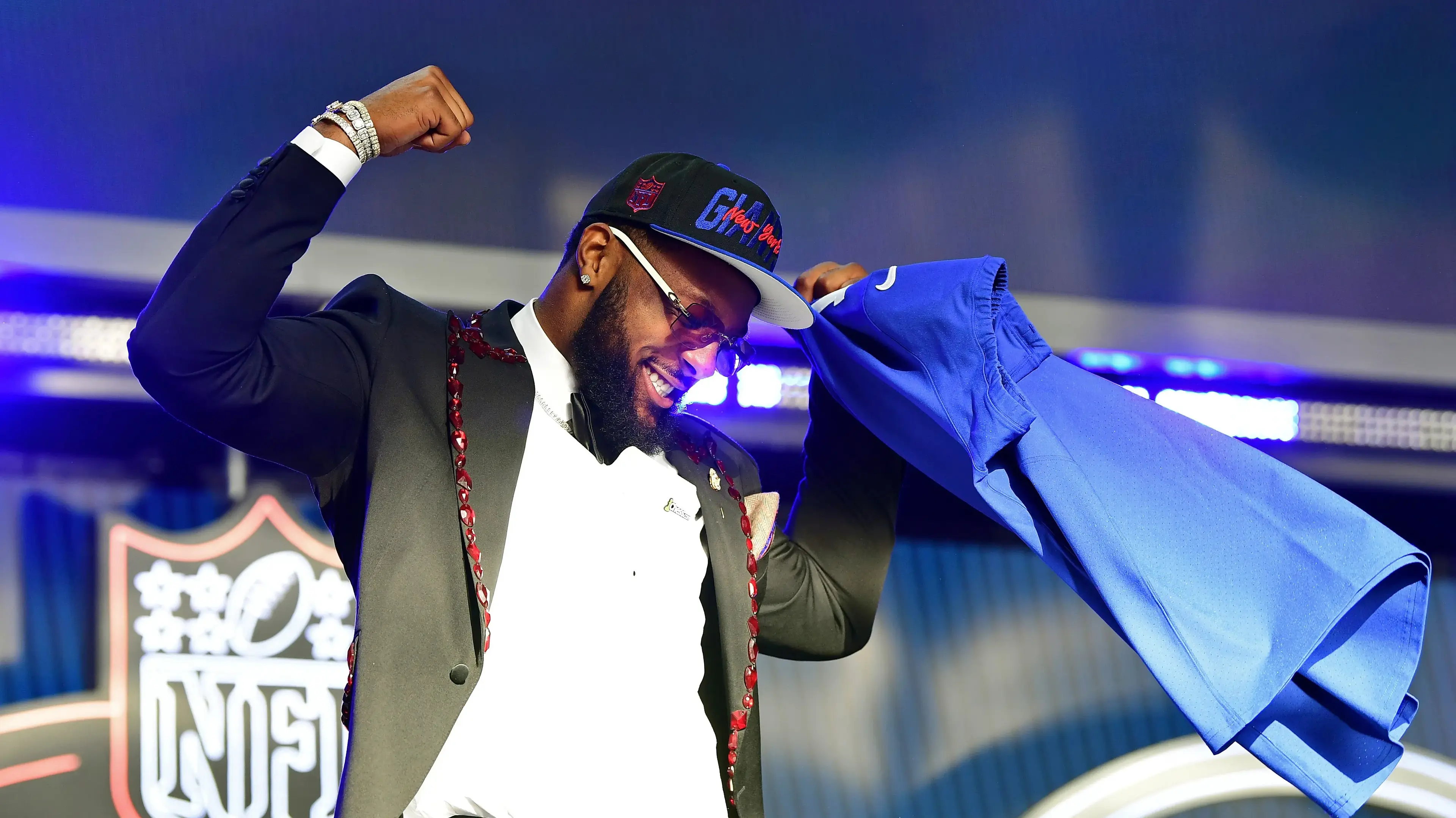 Apr 28, 2022; Las Vegas, NV, USA; Oregon defensive end Kayvon Thibodeaux reacts after being selected as the fifth overall pick to the New York Giants during the first round of the 2022 NFL Draft at the NFL Draft Theater. / Gary Vasquez-USA TODAY Sports