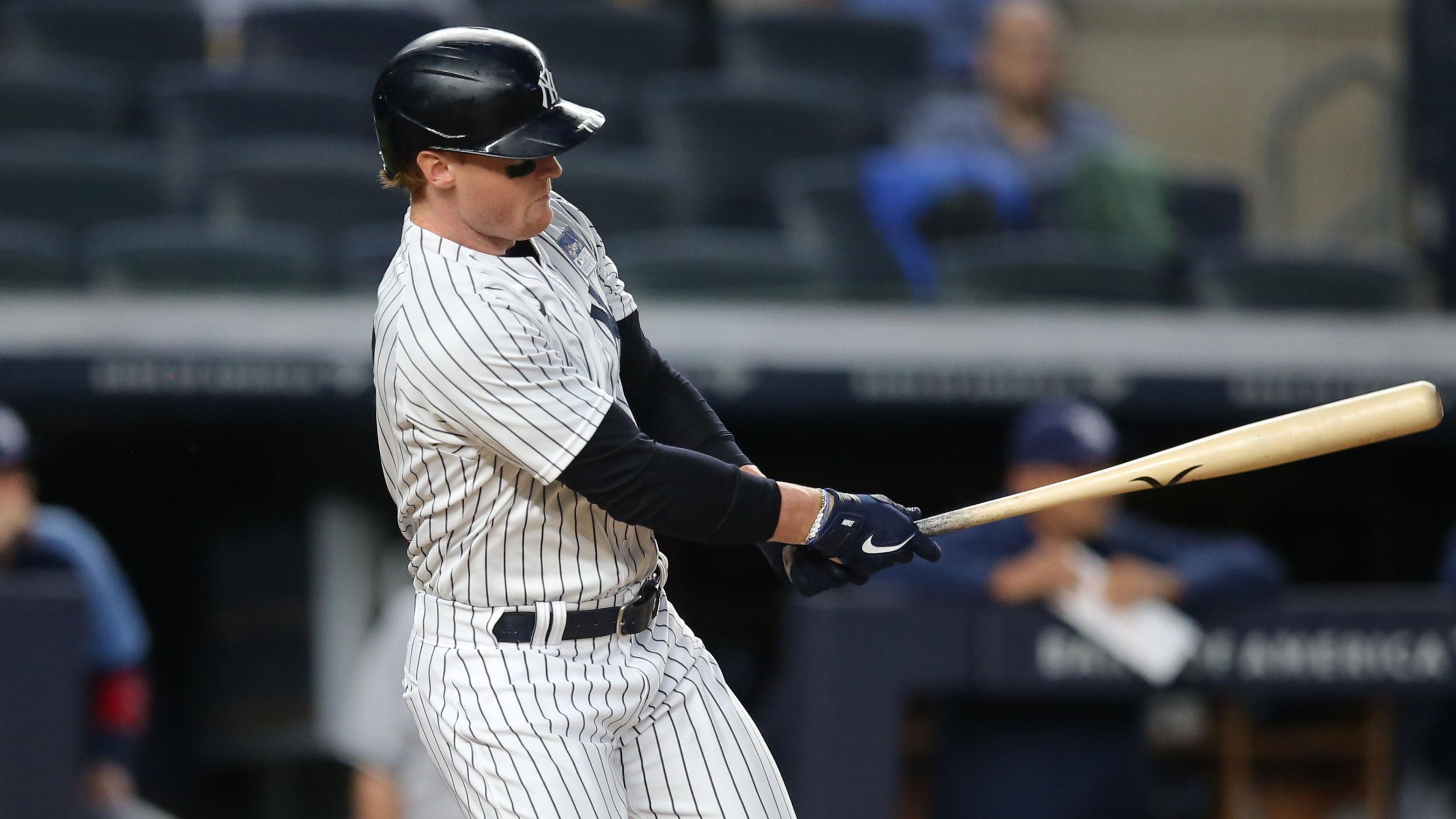 Jun 2, 2021; Bronx, New York, USA; New York Yankees right fielder Clint Frazier (77) follows through on a two run single against the Tampa Bay Rays during the fourth inning at Yankee Stadium.