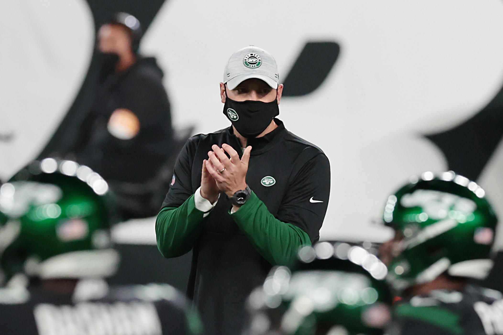 Oct 1, 2020; East Rutherford, New Jersey, USA; New York Jets head coach Adam Gase claps before the game against the Denver Broncos at MetLife Stadium