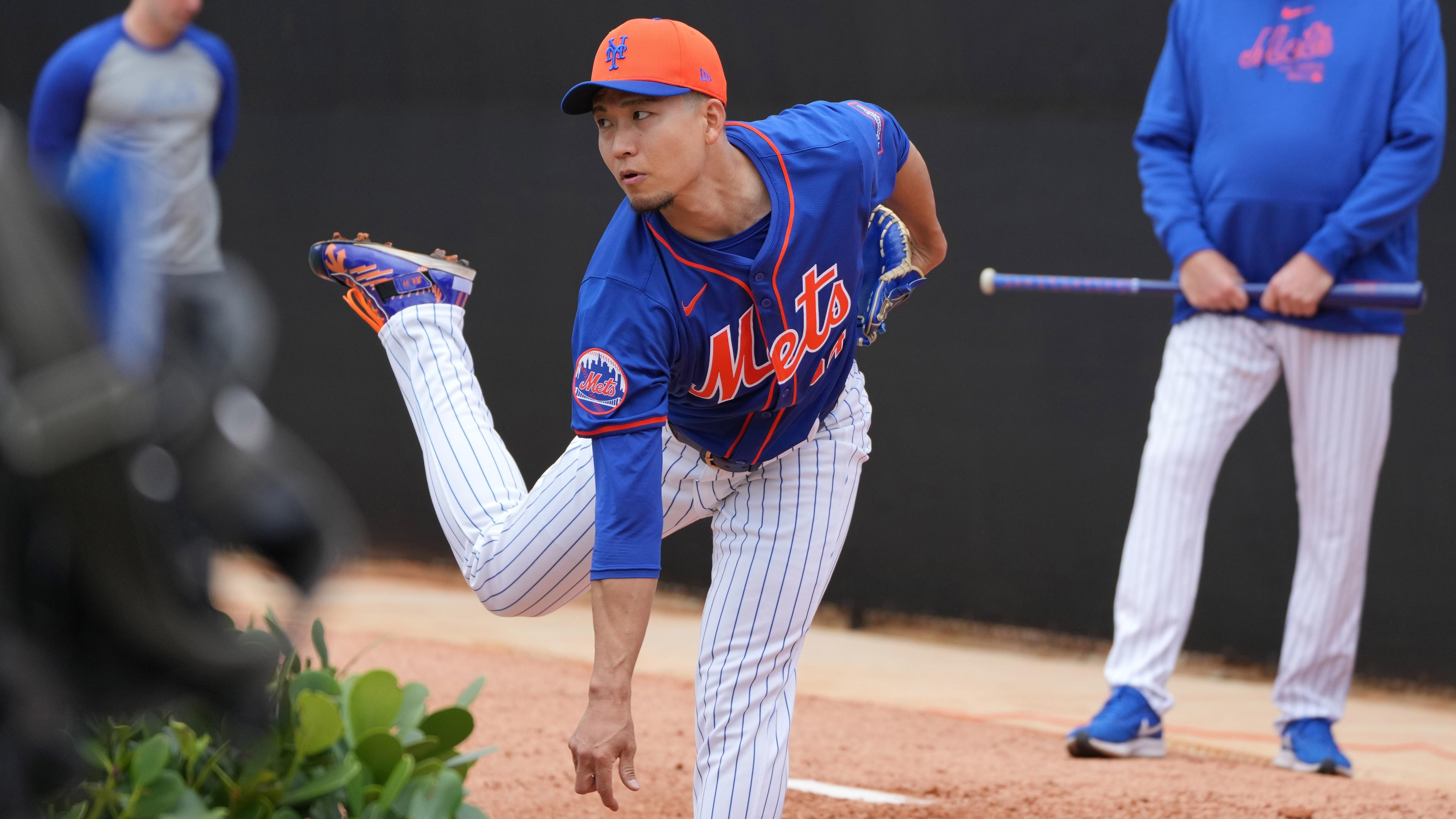 Feb 19, 2024; Port St. Lucie, FL, USA; New York Mets starting pitcher Kodai Senga (34) warms-up during workouts at spring training.