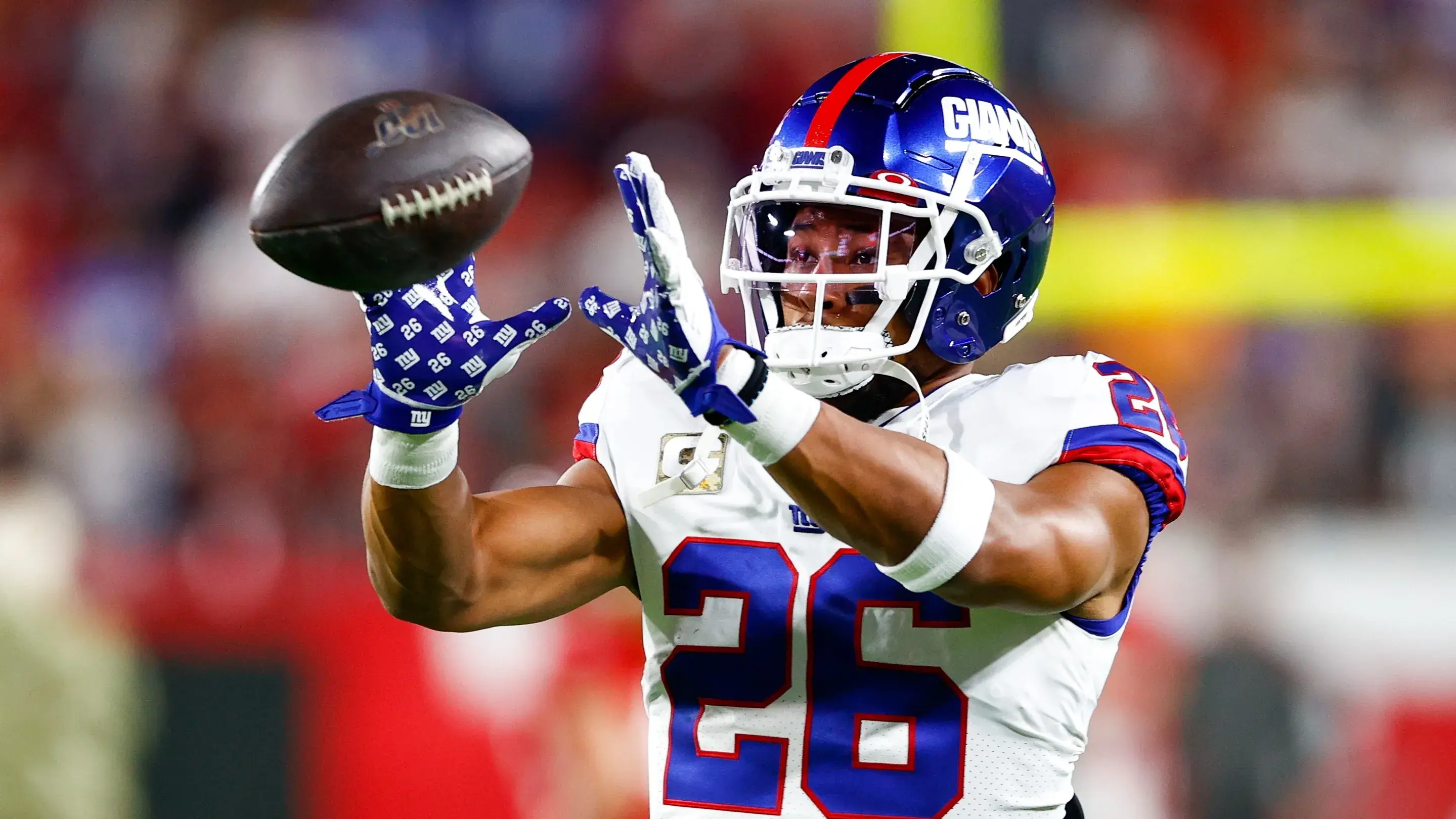 Nov 22, 2021; Tampa, Florida, USA; New York Giants running back Saquon Barkley (26) warms up prior to a game against the Tampa Bay Buccaneers at Raymond James Stadium. Mandatory Credit: Nathan Ray Seebeck-USA TODAY Sports / Nathan Ray Seebeck-USA TODAY Sports