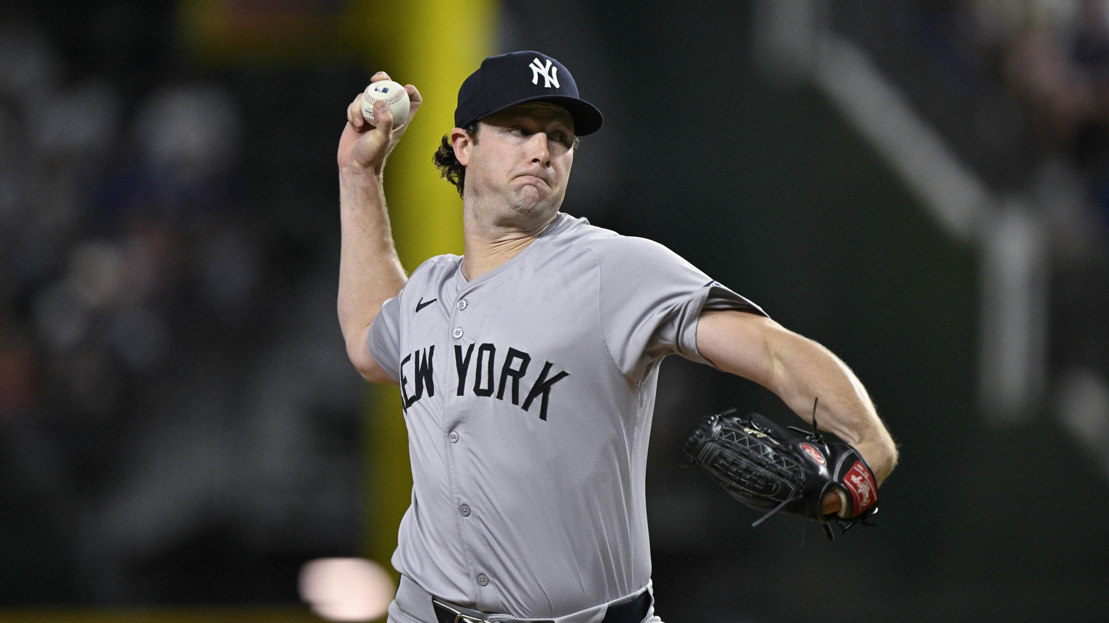 Sep 2, 2024; Arlington, Texas, USA; New York Yankees starting pitcher Gerrit Cole (45) pitches against the Texas Rangers during the first inning at Globe Life Field. Mandatory Credit: Jerome Miron-USA TODAY Sports