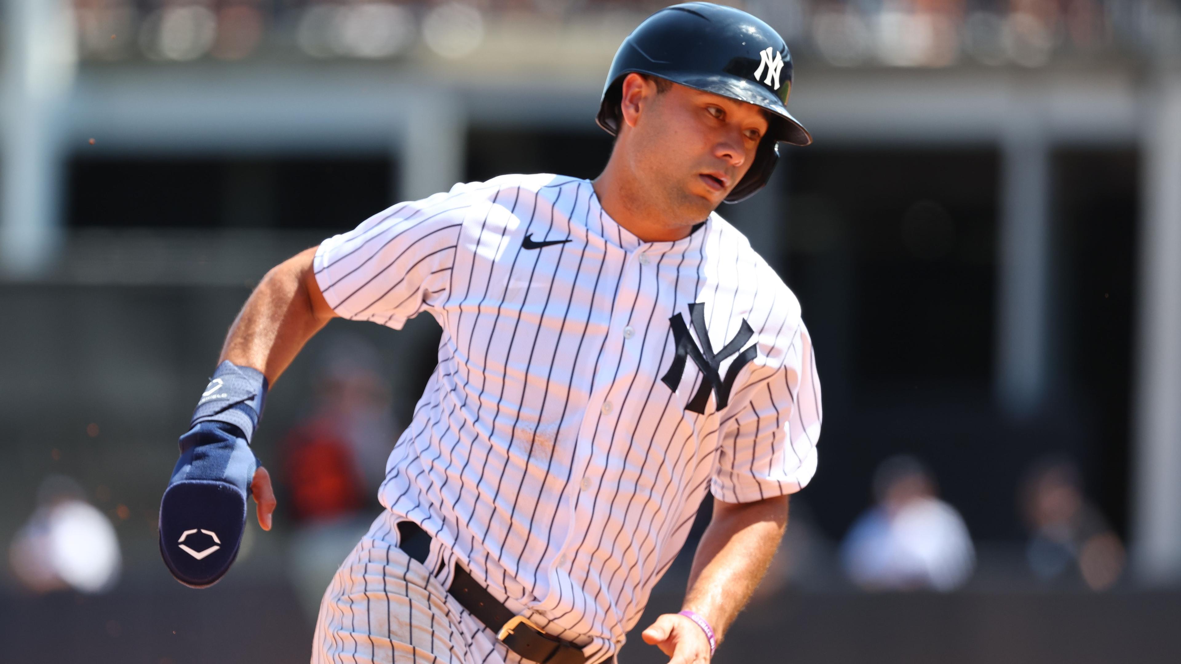 New York Yankees infielder Isiah Kiner-Falefa (12) runs home to score a run during the fourth inning against the Detroit Tigers during spring training at George M. Steinbrenner Field.