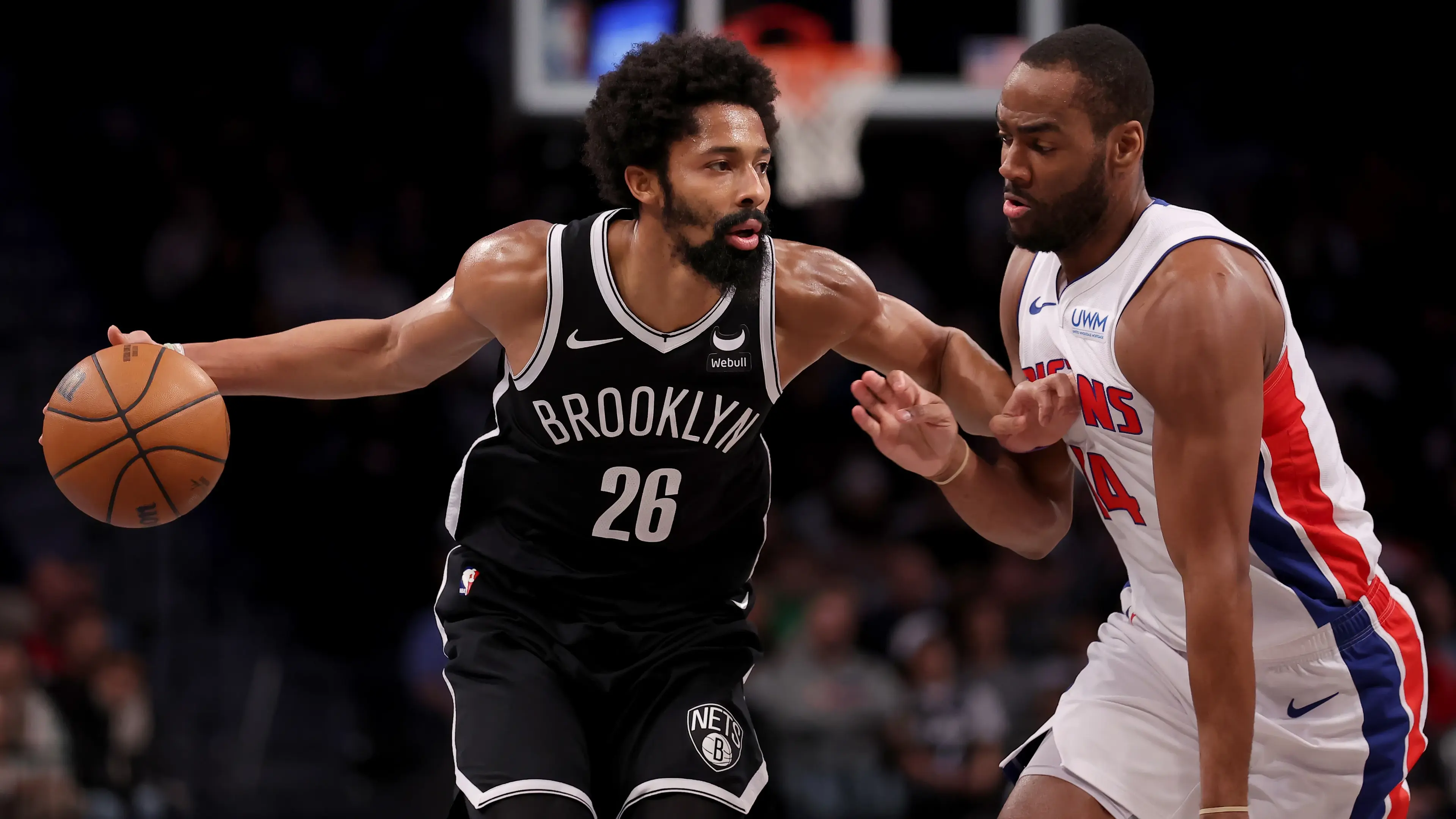 Brooklyn Nets guard Spencer Dinwiddie (26) controls the ball against Detroit Pistons guard Alec Burks (14) during the first quarter at Barclays Center. / Brad Penner-USA TODAY Sports