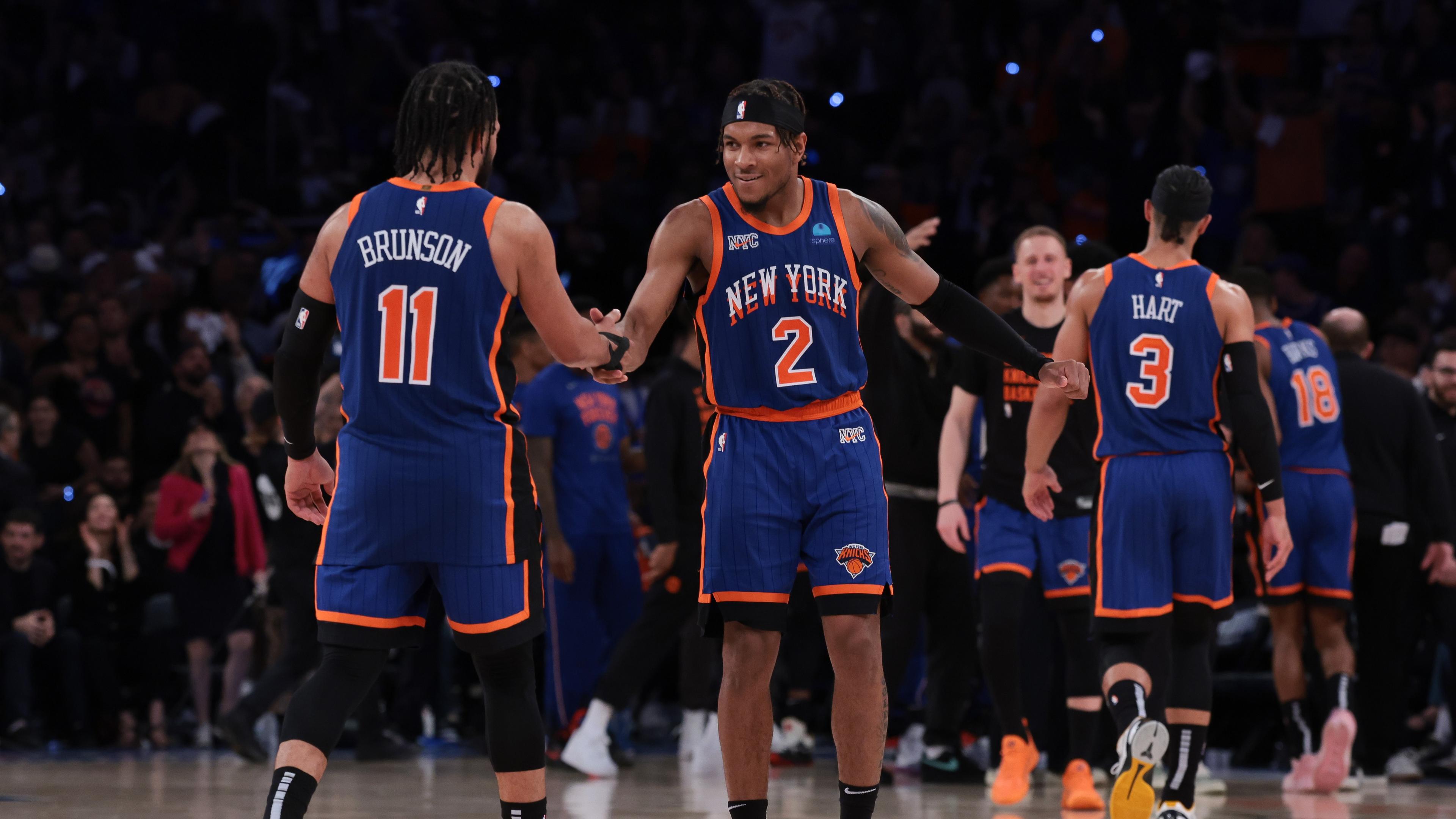 May 14, 2024; New York, New York, USA; New York Knicks guard Miles McBride (2) celebrates with guard Jalen Brunson (11) during the second half during game five of the second round for the 2024 NBA playoffs against the Indiana Pacers at Madison Square Garden. Mandatory Credit: Vincent Carchietta-Imagn Images