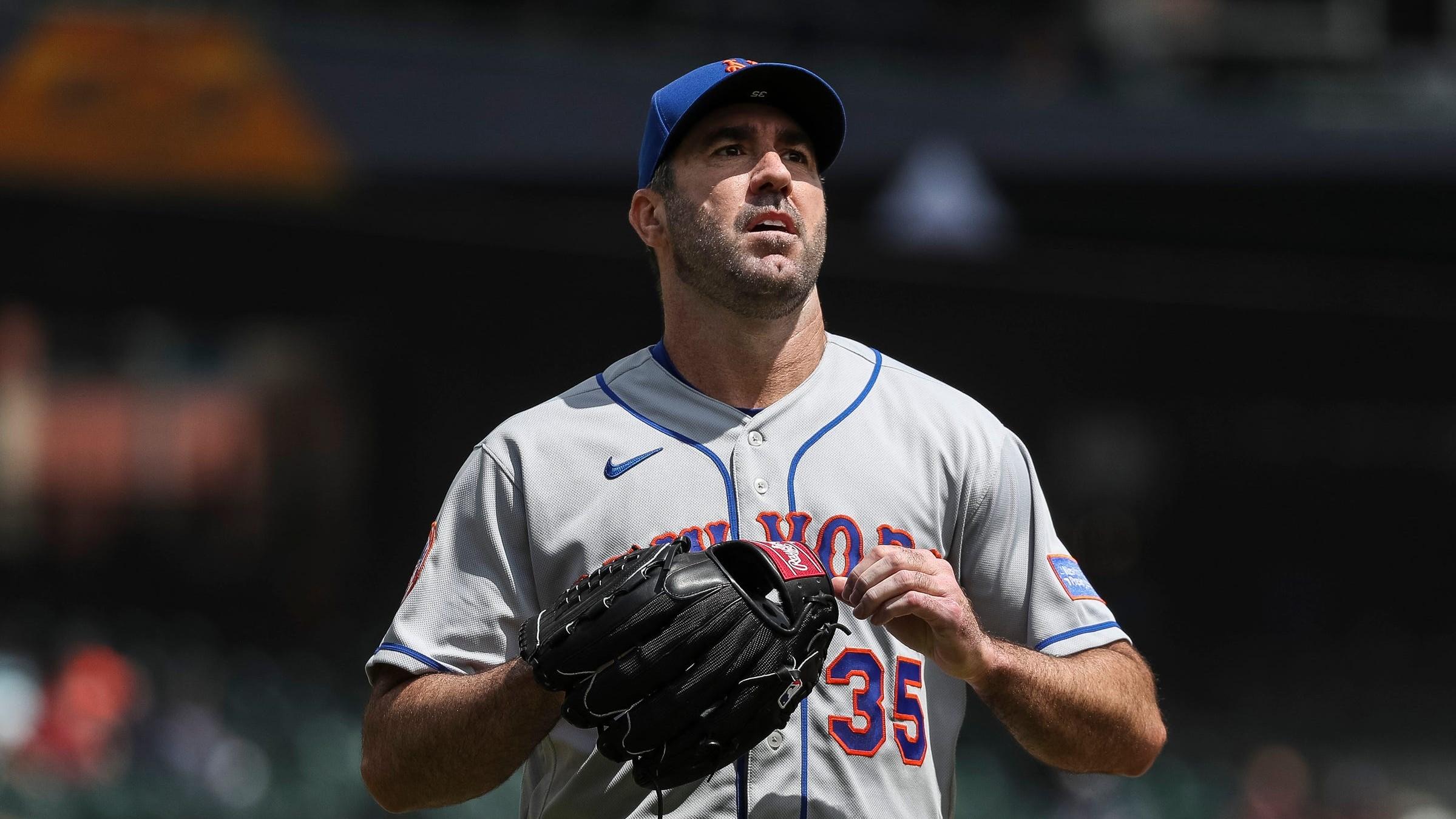 Mets pitcher Justin Verlander walks off the field after pitching against the Tigers during the third inning at Comerica Park on Thursday, May 4, 2023.