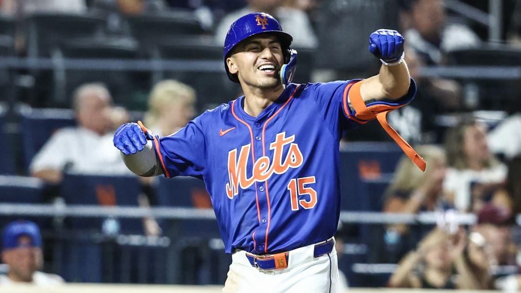 Jun 26, 2024; New York City, New York, USA; New York Mets right fielder Tyrone Taylor (15) celebrates after hitting a three run home run in the sixth inning against the New York Yankees at Citi Field.