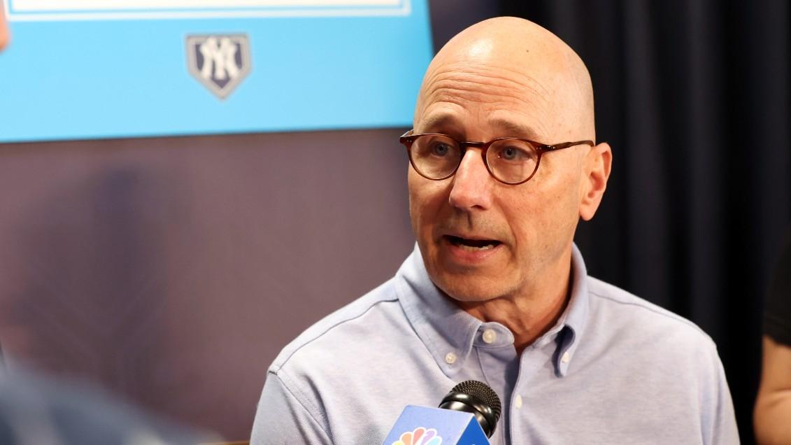 New York Yankees general manager Brian Cashman talks with media at George M. Steinbrenner Field.