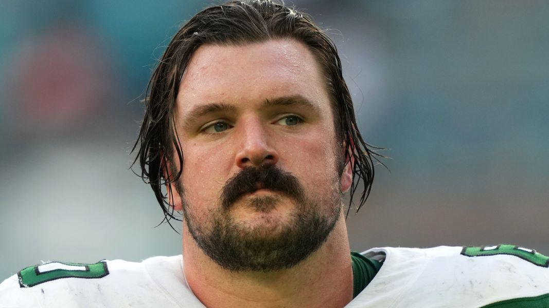 Dec 19, 2021; Miami Gardens, Florida, USA; New York Jets center Connor McGovern (60) leaves the field after the game against the Miami Dolphins at Hard Rock Stadium