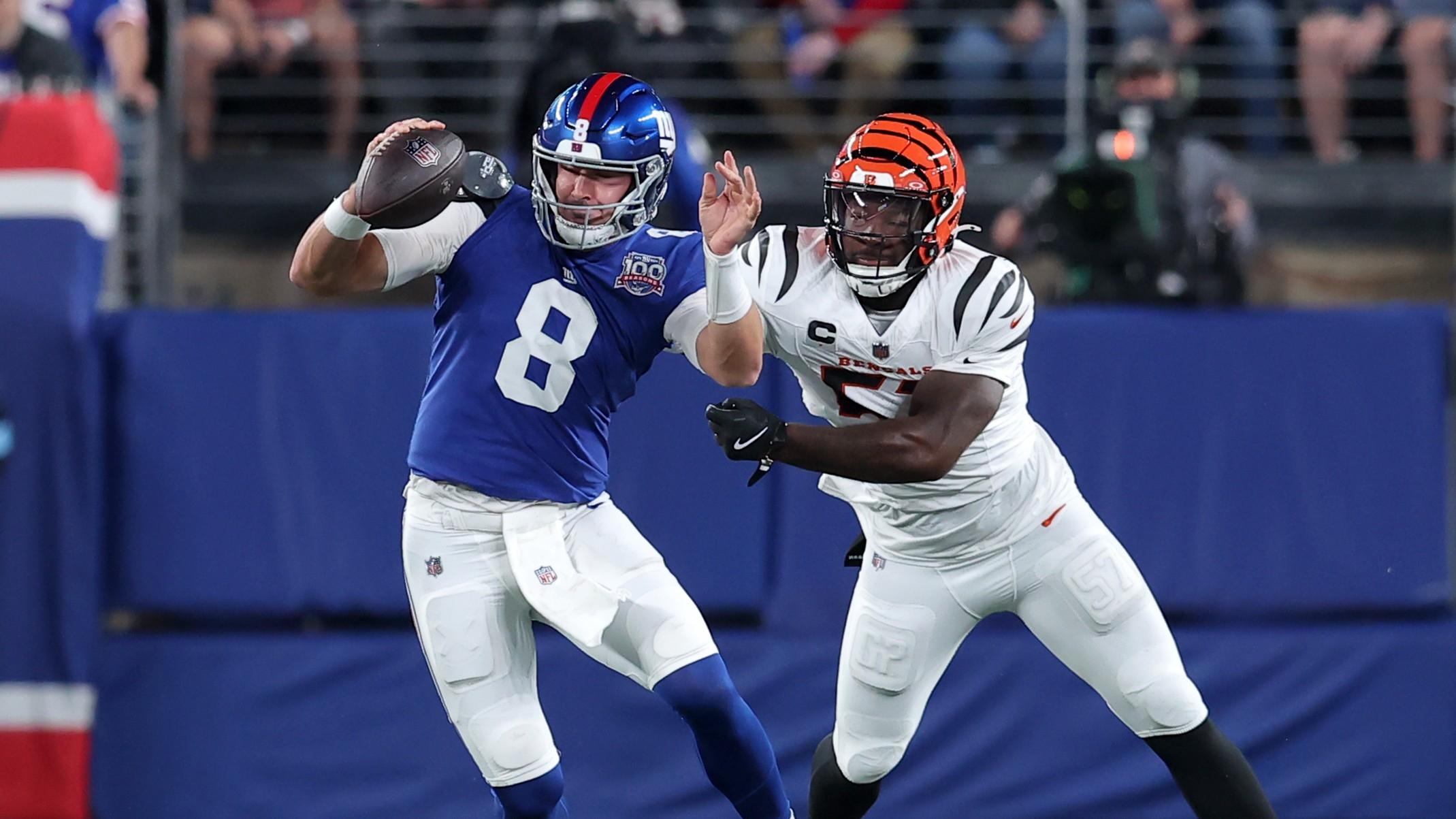 Cincinnati Bengals linebacker Germaine Pratt (57) pressures New York Giants quarterback Daniel Jones (8) during the first quarter at MetLife Stadium.