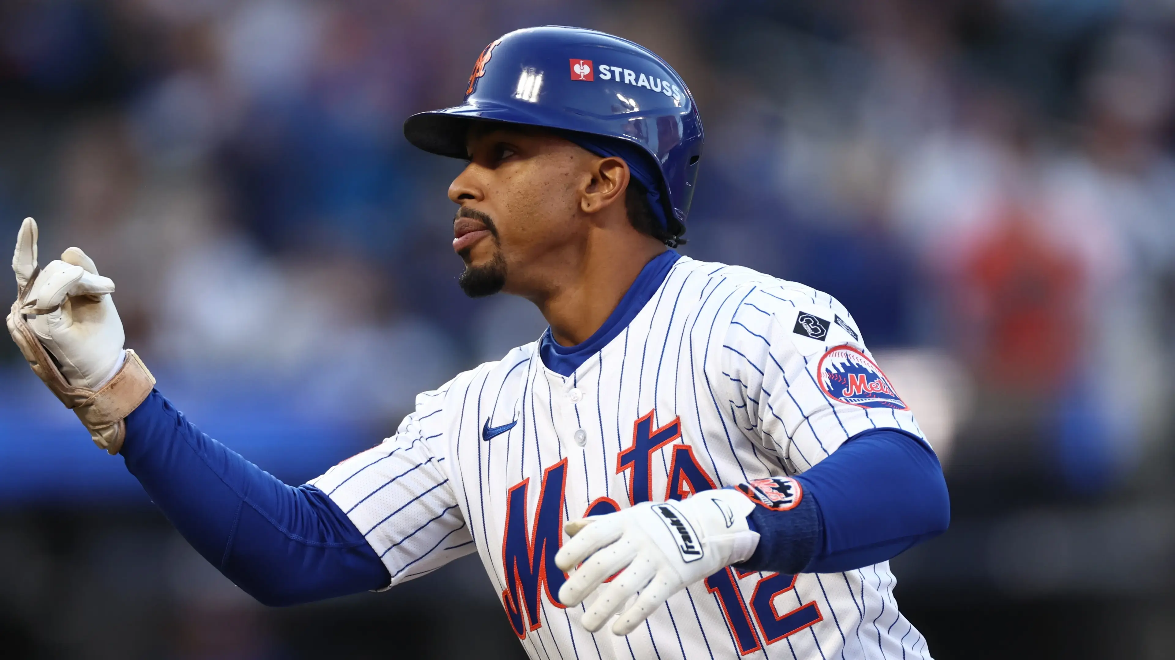 Oct 18, 2024; New York City, New York, USA; New York Mets shortstop Francisco Lindor (12) hits a single during the first inning against the Los Angeles Dodgers during game five of the NLCS for the 2024 MLB playoffs at Citi Field. Mandatory Credit: Vincent Carchietta-Imagn Images / © Vincent Carchietta-Imagn Images