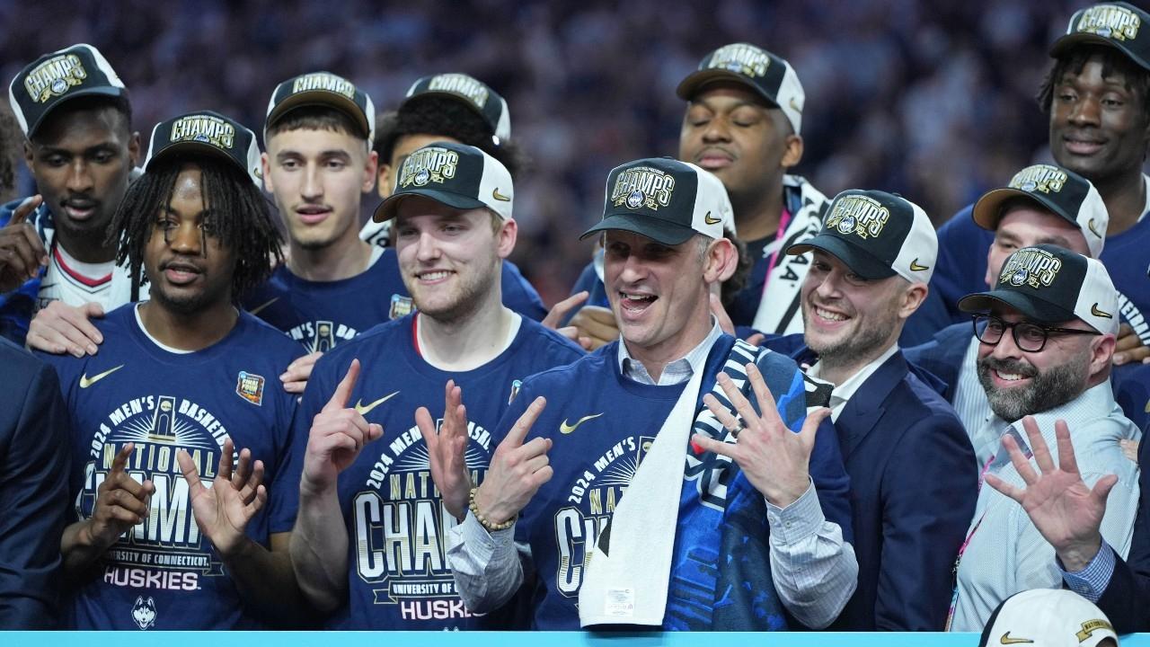 Connecticut Huskies head coach Dan Hurley celebrates after winning the national championship game of the Final Four of the 2024 NCAA Tournament against the Purdue Boilermakers at State Farm Stadium.