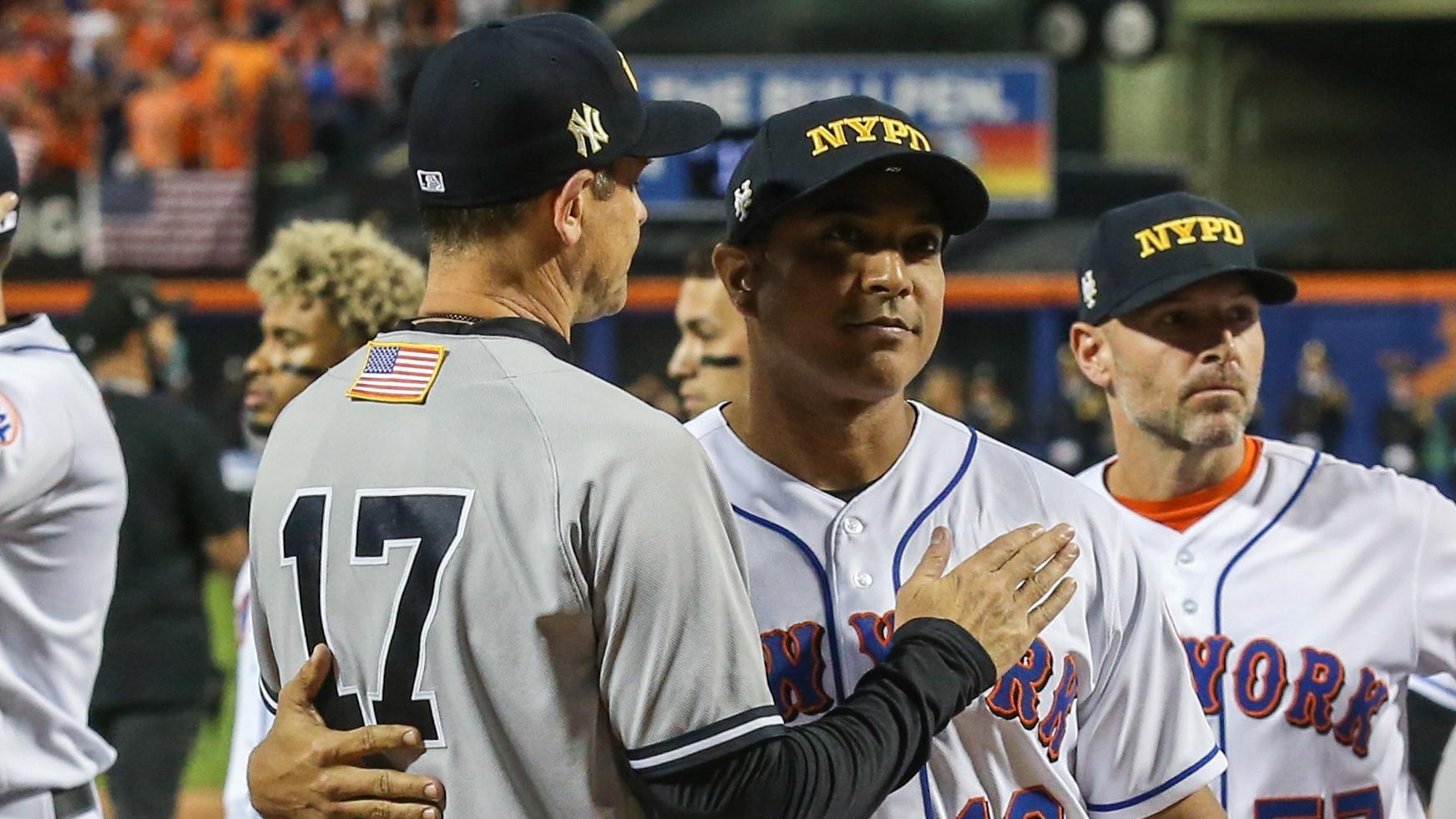 Sep 11, 2021; New York City, New York, USA; New York Yankees manager Aaron Boone (17) and New York Mets manager Luis Rojas (19) at Citi Field. Mandatory Credit: Wendell Cruz-USA TODAY Sports