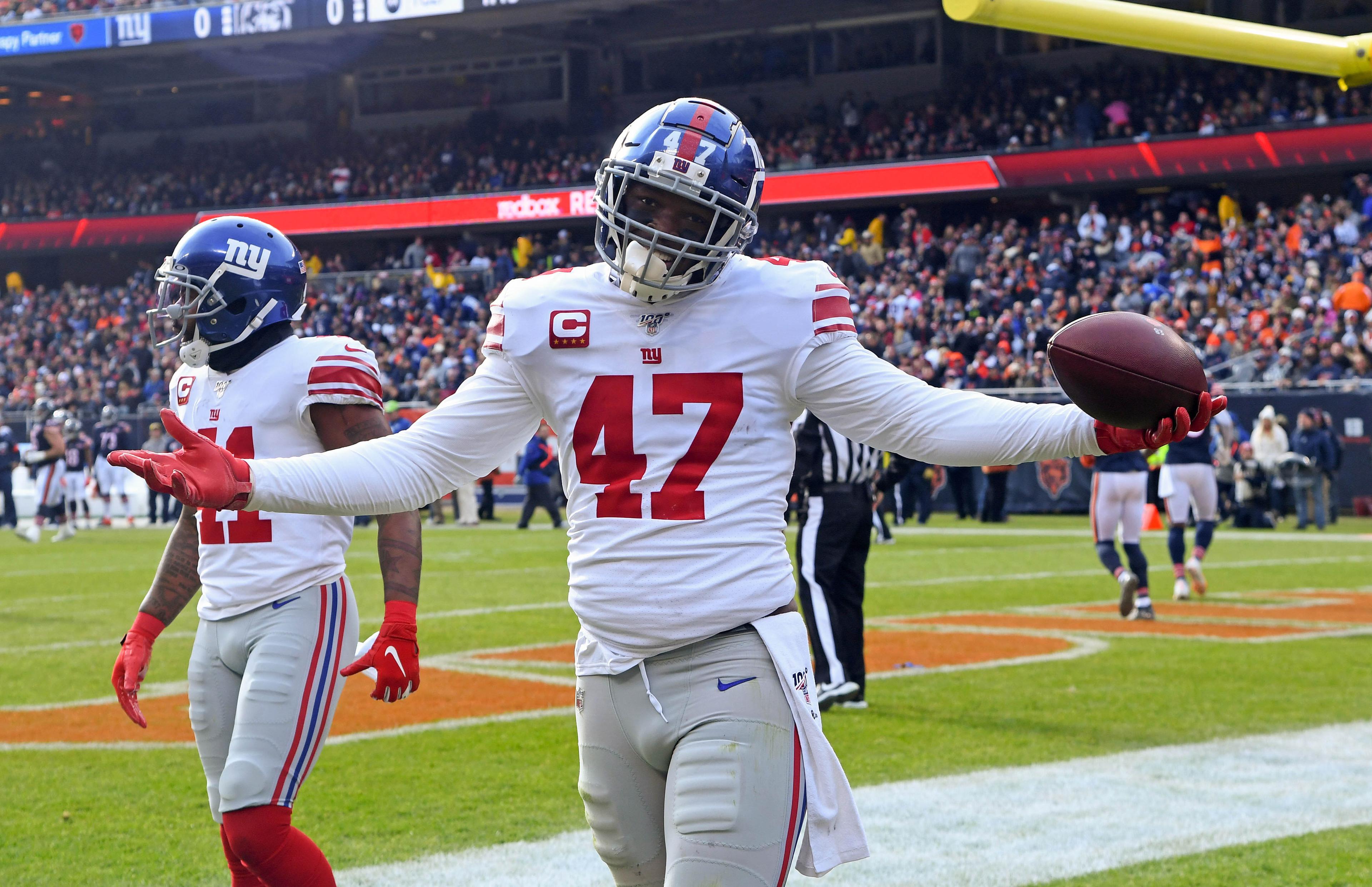 Nov 24, 2019; Chicago, IL, USA; New York Giants outside linebacker Alec Ogletree (47) reacts after making an interception against the Chicago Bears during the first quarter at Soldier Field. Mandatory Credit: Mike DiNovo-USA TODAY Sports