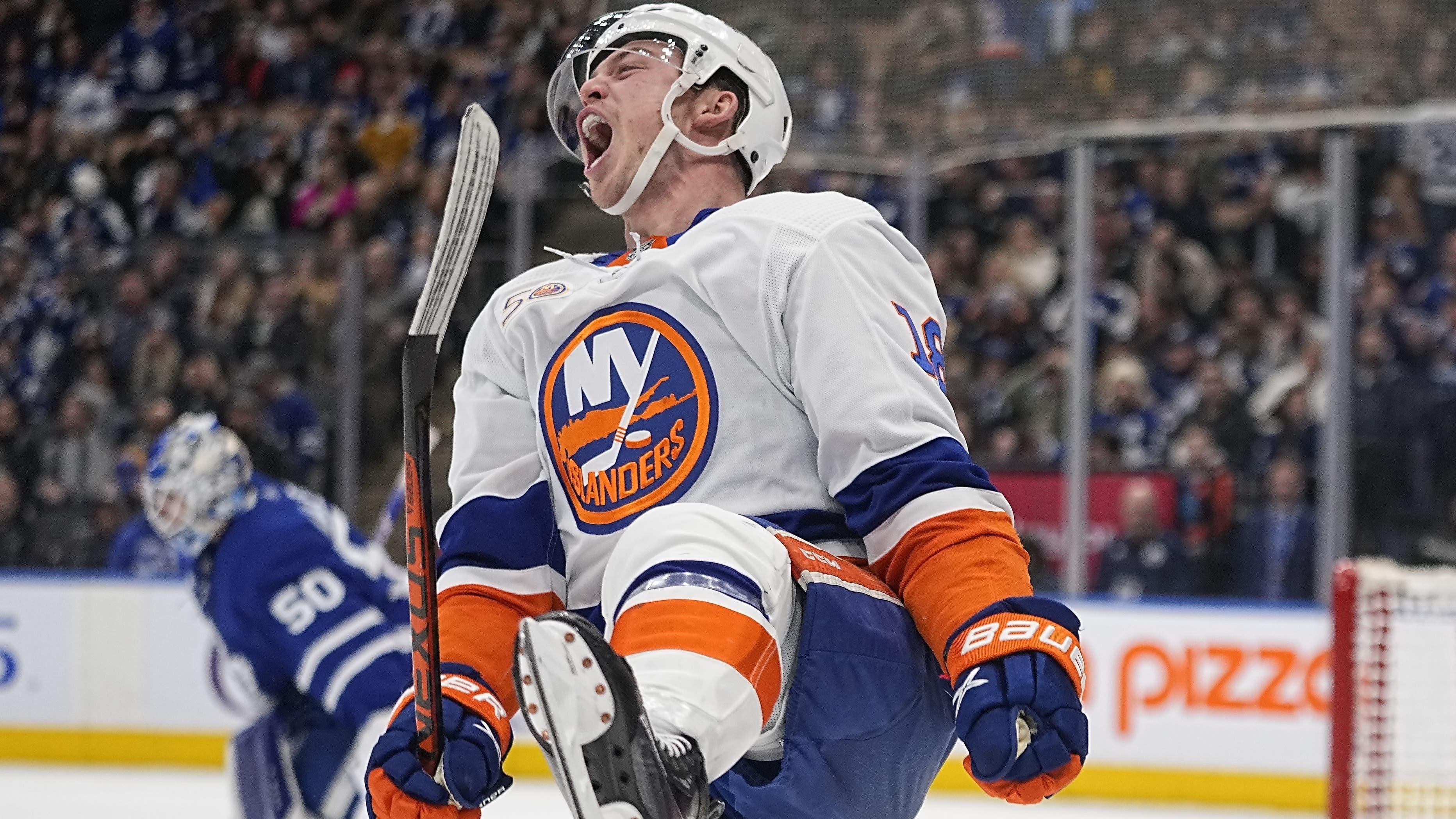 New York Islanders forward Anthony Beauvillier (18) celebrates his overtime goal against Toronto Maple Leafs goaltender Erik Kallgren (50) at Scotiabank Arena / John E. Sokolowski - USA TODAY Sports