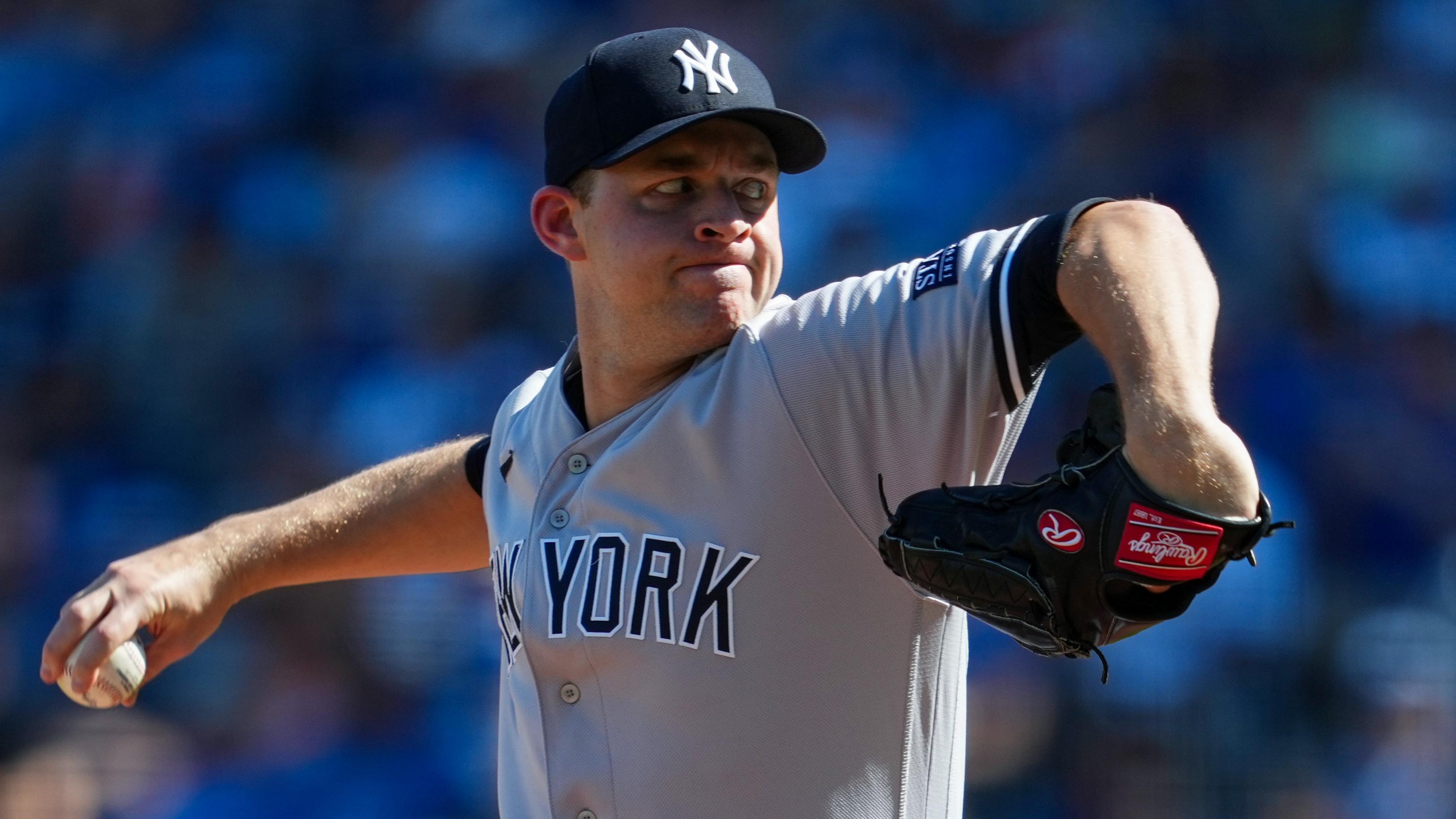 Oct 1, 2023; Kansas City, Missouri, USA; New York Yankees starting pitcher Michael King (34) pitches during the first inning at Kauffman Stadium. Mandatory Credit: Jay Biggerstaff-USA TODAY Sports