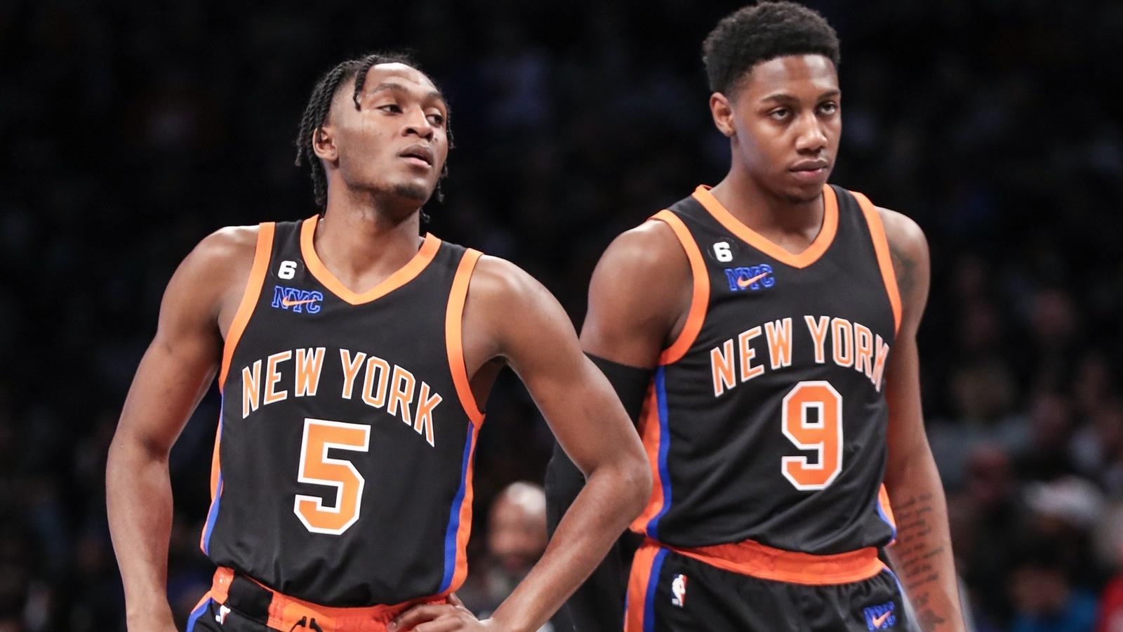 New York Knicks guards Immanuel Quickley (5) and RJ Barrett (9) check back into the game in the second quarter against the Brooklyn Nets at Barclays Center.